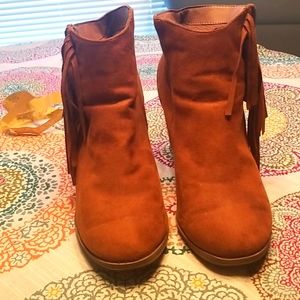 The fringe ankle boots are comfortable